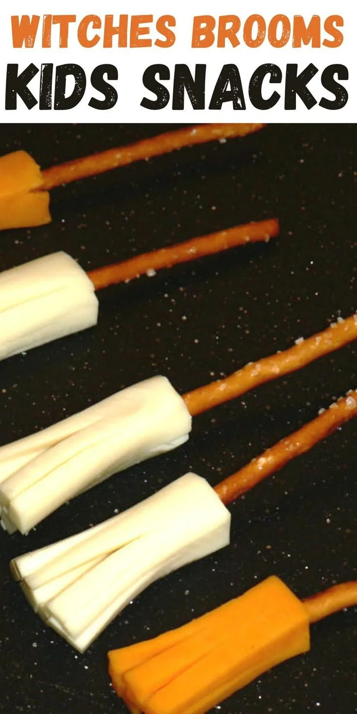 A collection of handcrafted witches brooms for Halloween decorations.
