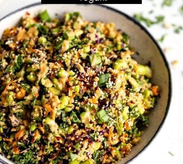 Bowl of Asian Crunch Edamame Salad with colorful veggies and dressing