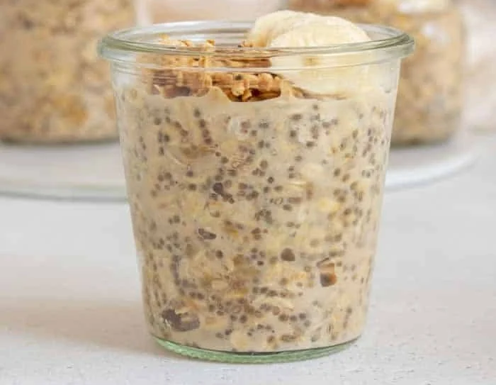 Bowl of brown sugar overnight oats topped with fruits and nuts