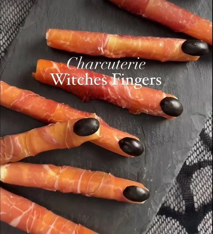 Charcuterie Witches Fingers Halloween platter with spooky cheese and meat