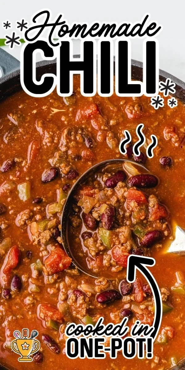 A bowl of spicy chili garnished with fresh herbs and peppers.