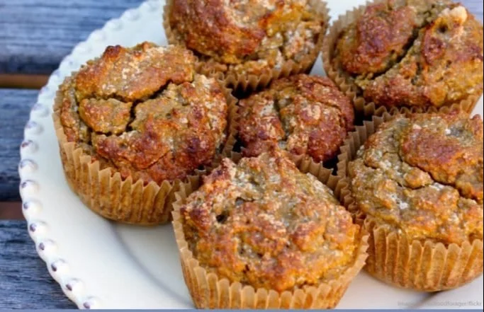 Coconut Sweet Potato Muffins fresh out of the oven, golden and fluffy.