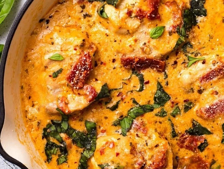 Creamy chicken one-pan dinner with vegetables and seasonings