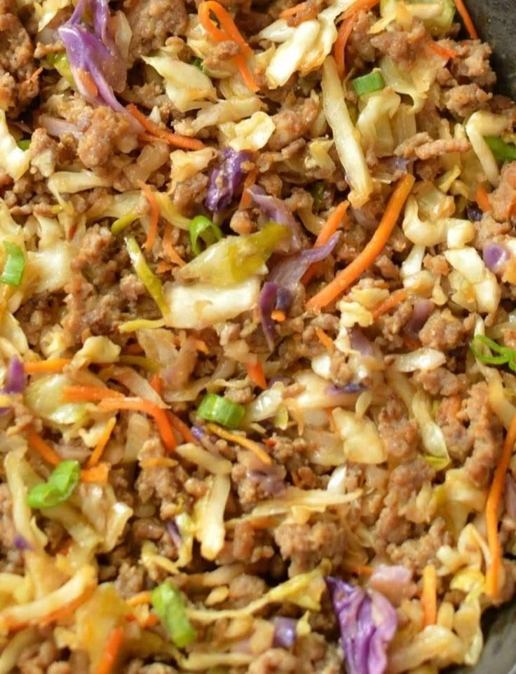 Delicious low carb egg roll bowl with fresh vegetables and protein.