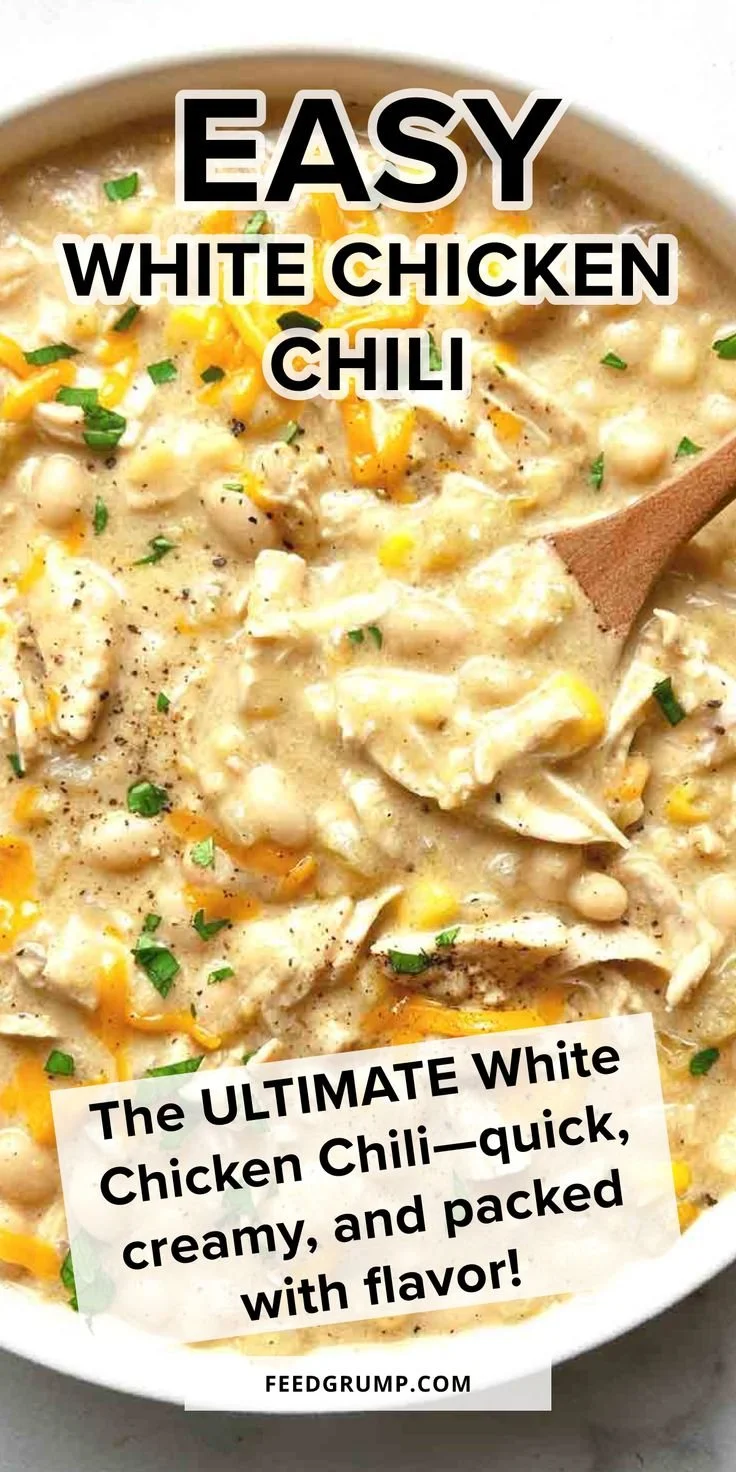 Bowl of easy white chicken chili topped with cilantro and lime wedges.