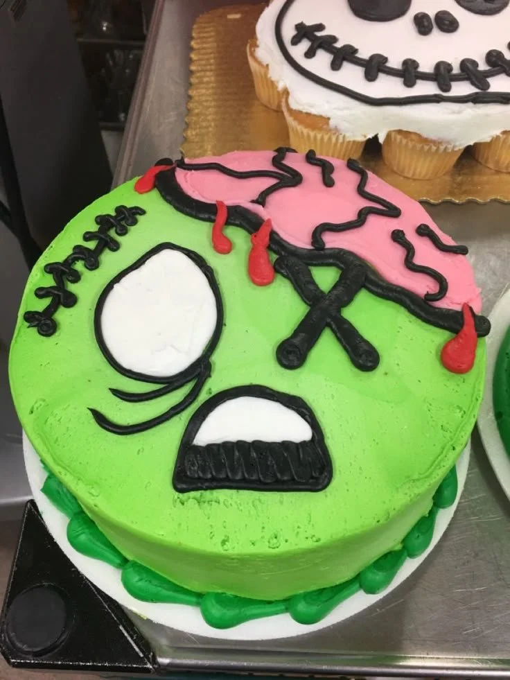 Festive Halloween cake decorated with spooky designs and vibrant colors