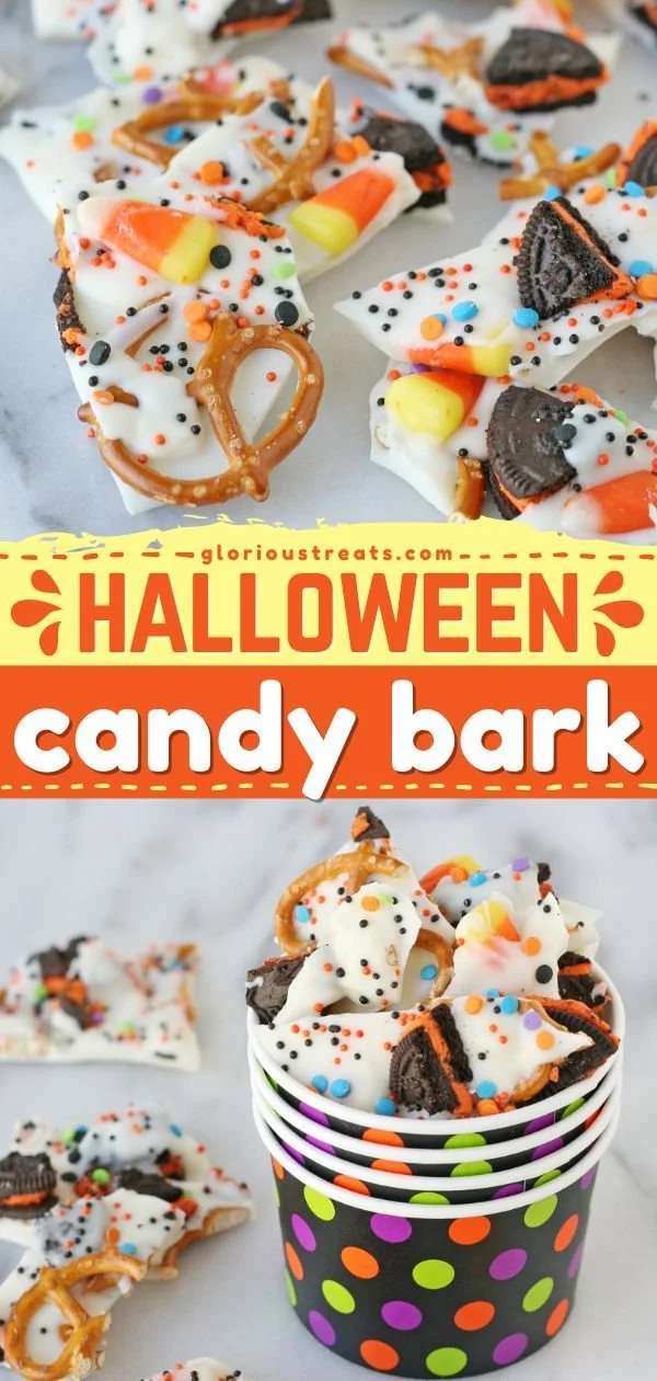 Colorful Halloween candy bark decorated with seasonal candies and chocolate.