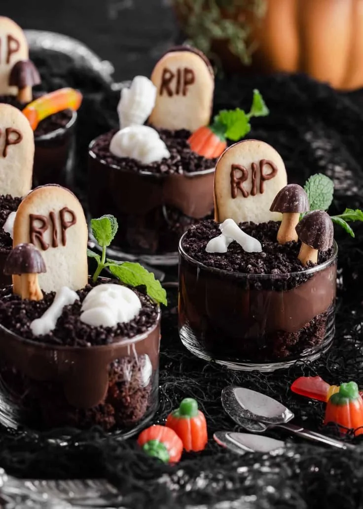 Halloween Dirt Pudding Cups with gummy worms and crushed cookies