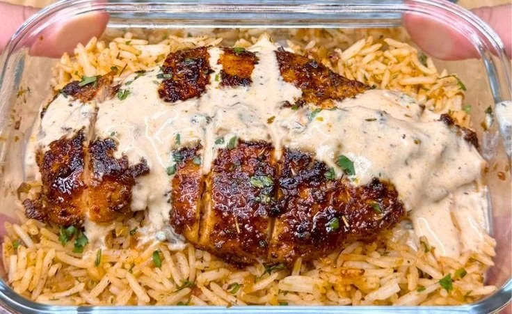 High Protein Creamy Cajun Chicken & Rice dish with colorful ingredients