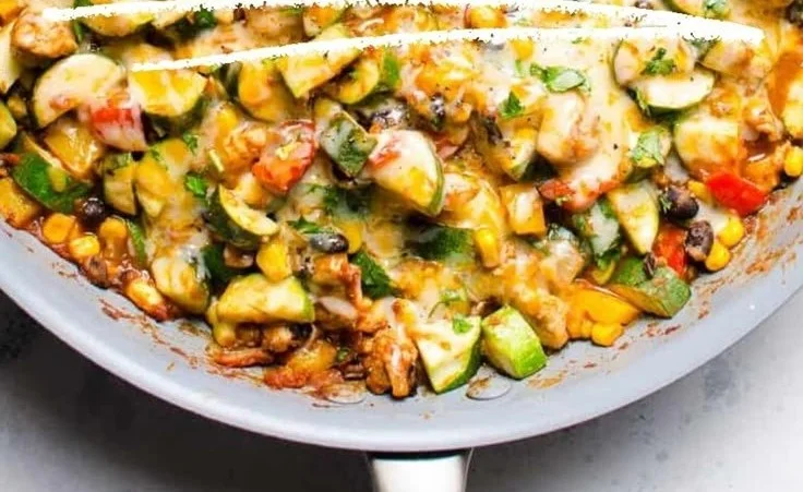 Mexican Chicken and Zucchini Skillet with colorful vegetables in a pan