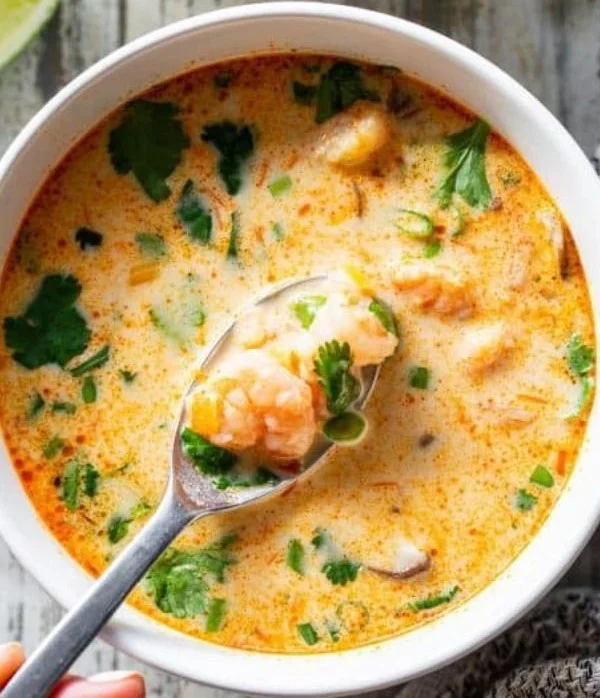 Delicious Paleo Thai Shrimp Soup with vibrant ingredients and herbs
