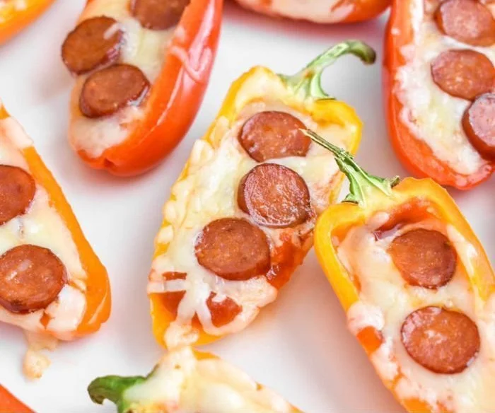 Pizza stuffed mini peppers filled with cheese and herbs