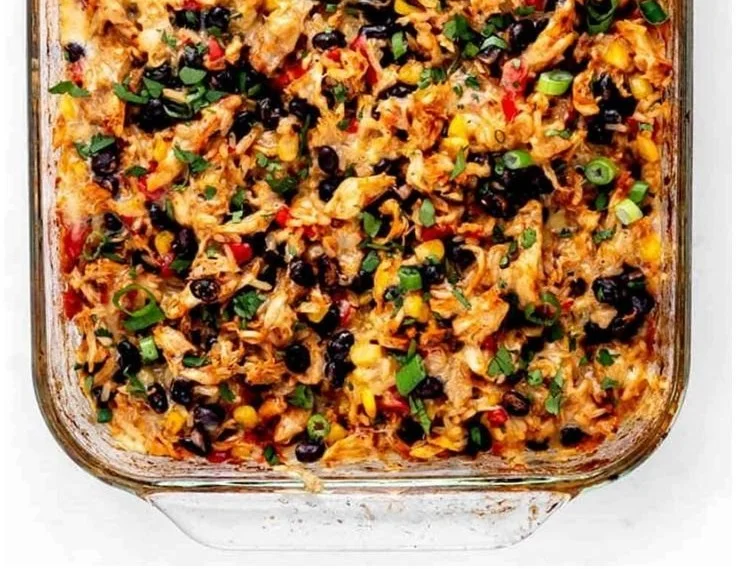 Delicious protein burrito casserole with beans, cheese, and toppings