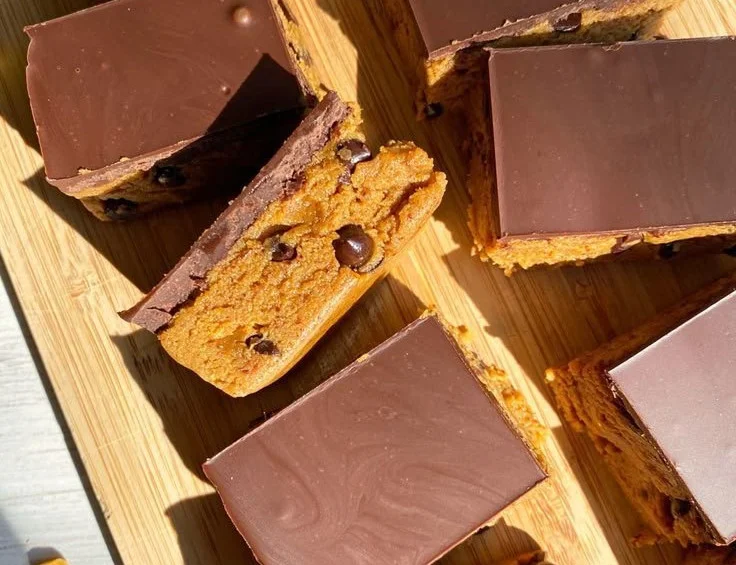 No bake vegan pumpkin protein bars on a white plate