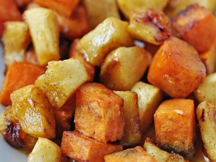 Roasted apple cinnamon sweet potatoes dish with vibrant colors