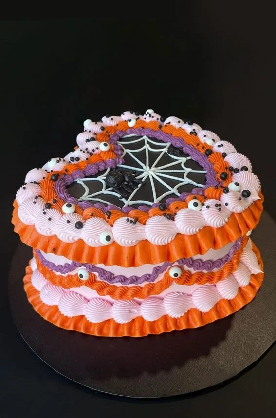 Delicious spooky Halloween cake with festive decorations for a Halloween celebration.