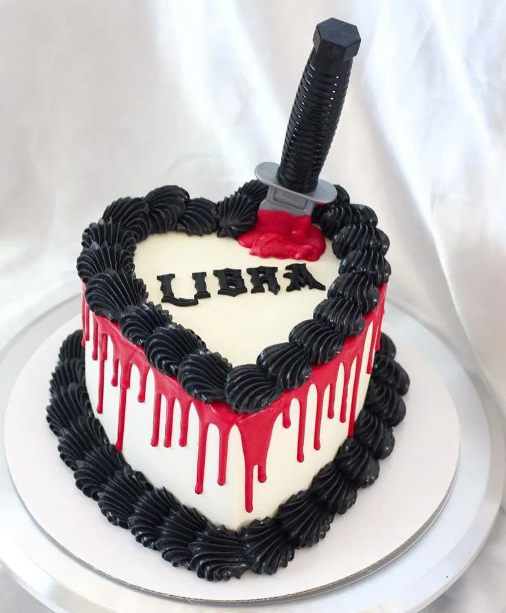 Delicious Black Libra cake design with heart shape and bloody cake elements.