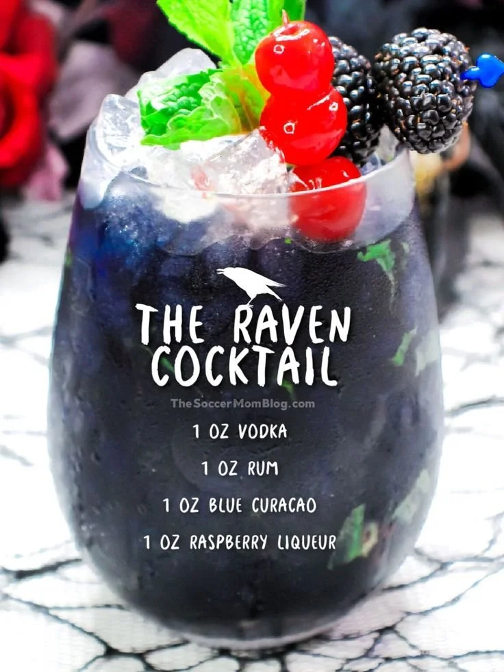 Black Raven cocktail with striking color and garnishes in a glass