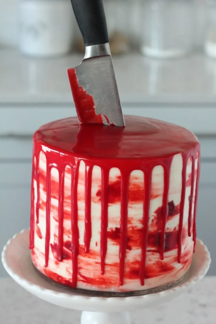 Blood-Drip Halloween Cake with red velvet and almond cream cheese frosting