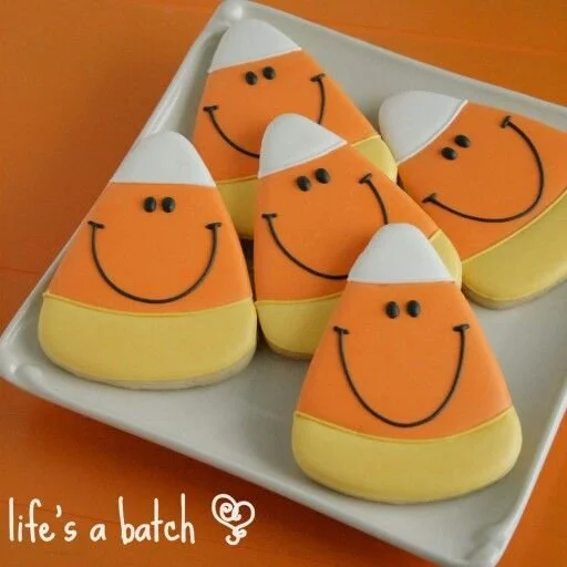 Decorated candy corn cookies perfect for Halloween festivities
