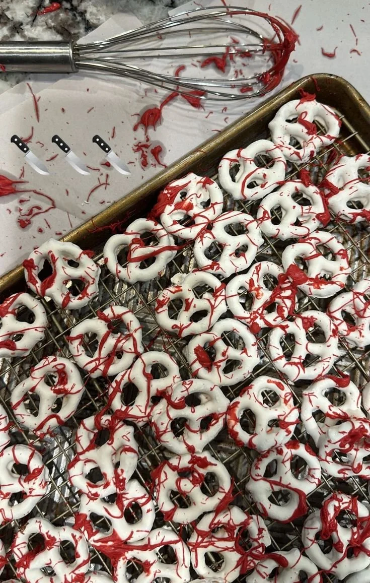 An assortment of Halloween foods including spooky treats and themed snacks.