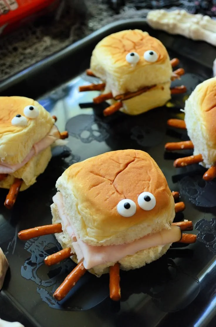 Spooky Halloween lunch ideas featuring creative sandwiches and festive treats.