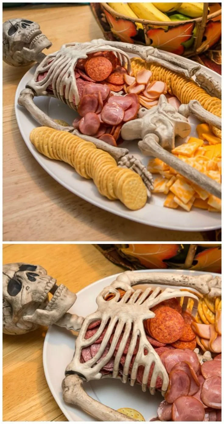 Variety of spooky Halloween snacks including candies, treats, and themed food.