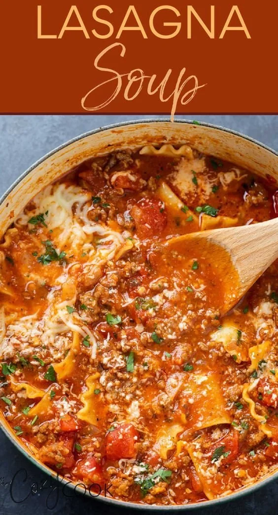 Bowl of cheesy lasagna soup filled with pasta and herbs.