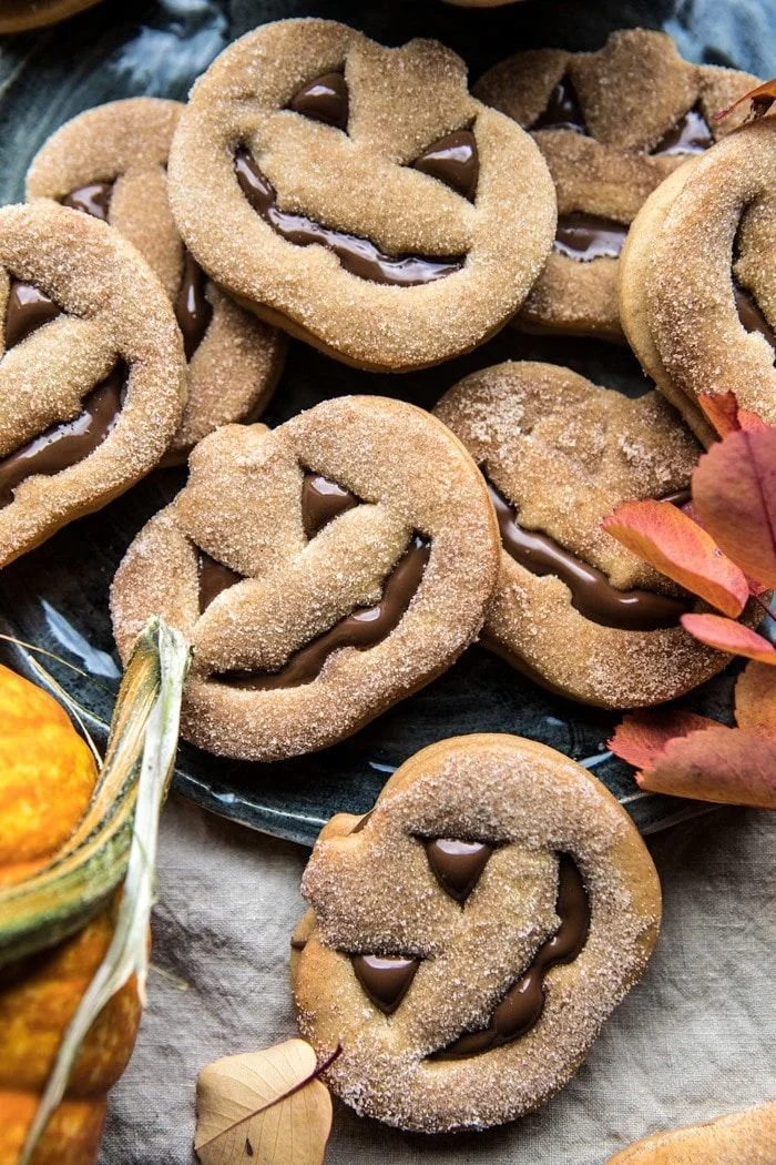 Milk chocolate stuffed jack-o'-lantern cookies for Halloween baking