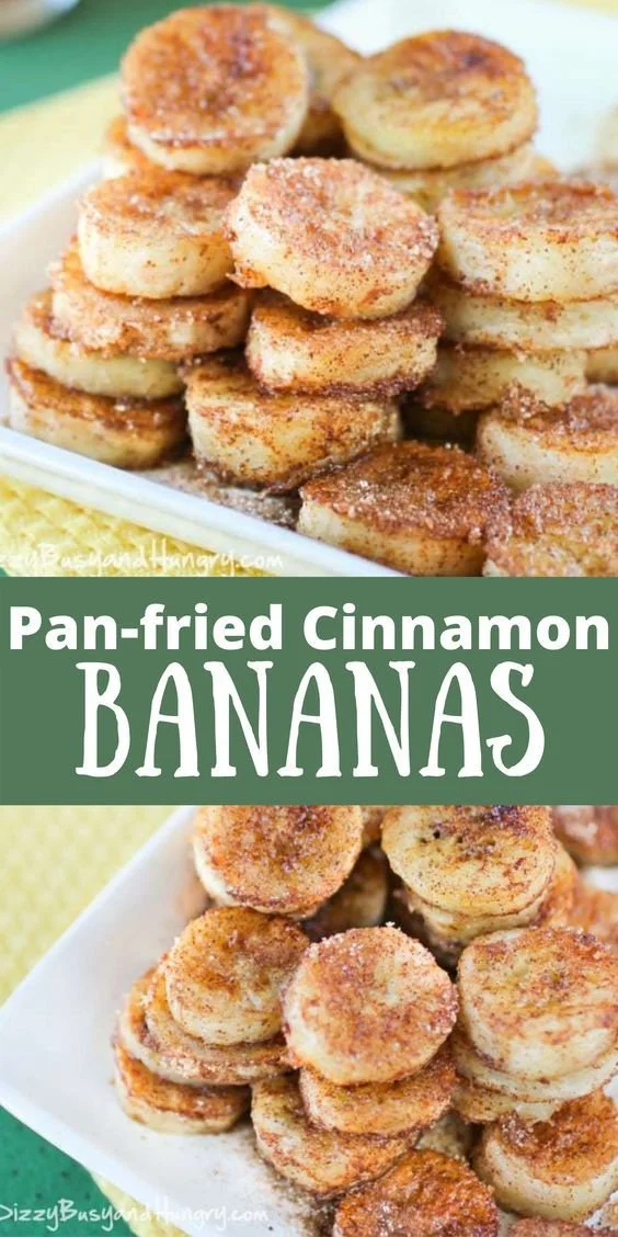 Pan-fried cinnamon bananas served on a plate with a sprinkle of cinnamon