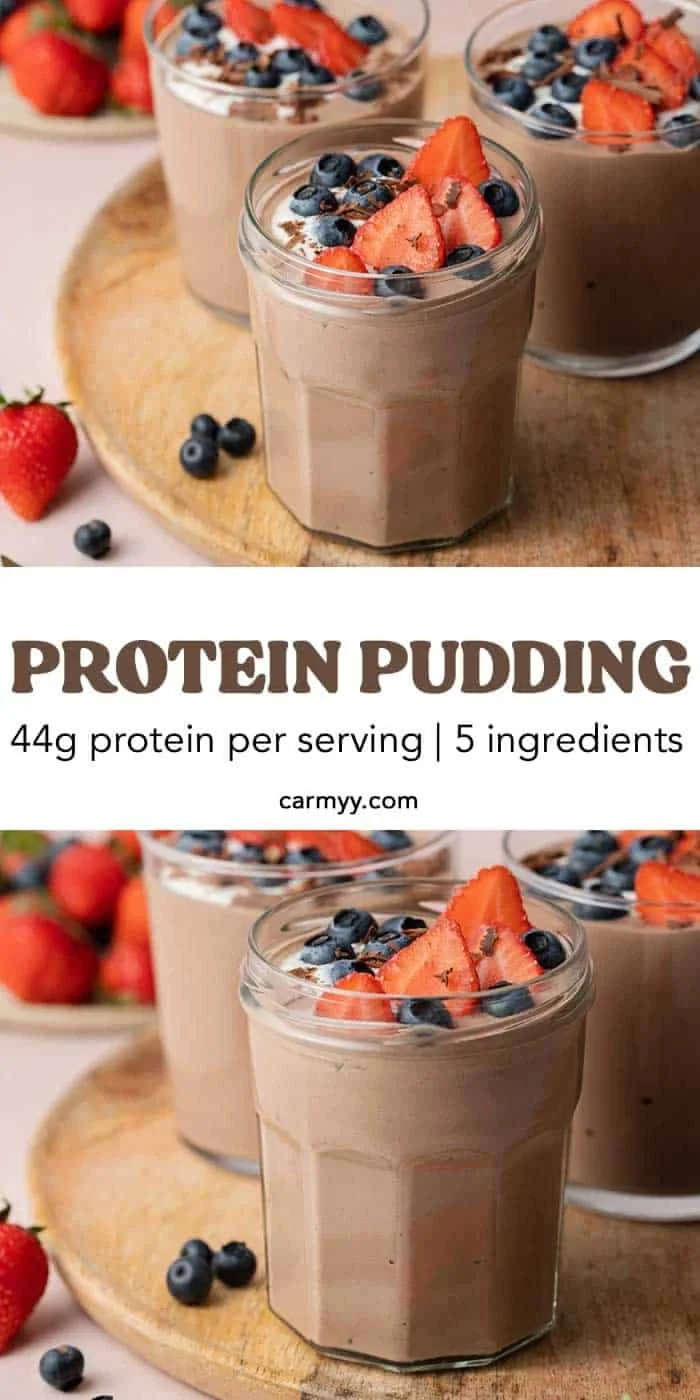 Creamy protein pudding in a bowl topped with berries and nuts