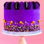 purple halloween themed cake with sprinkles and bl 2026 08 06 194227 1