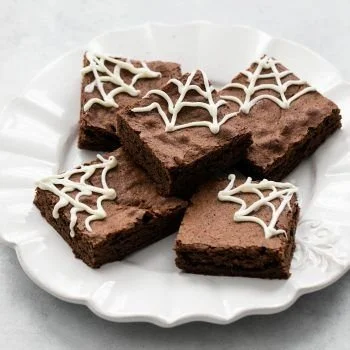 Delicious spider web brownies decorated for Halloween dessert celebration