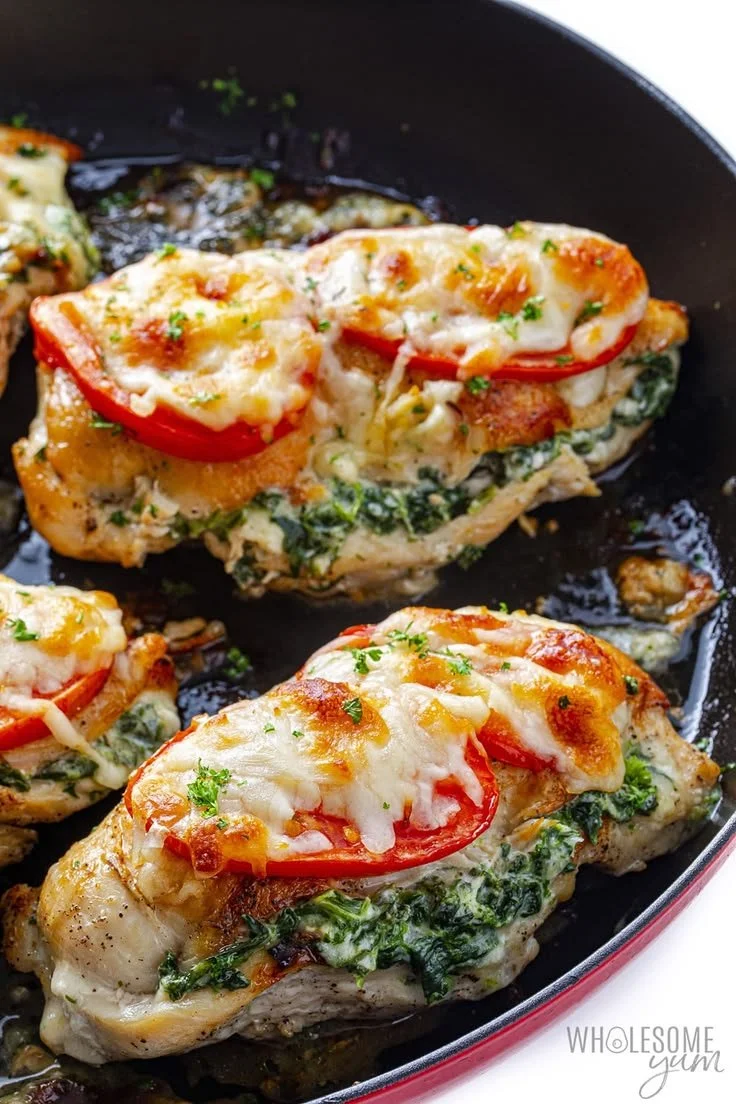 Spinach stuffed chicken breast with cheese, ready to be served.