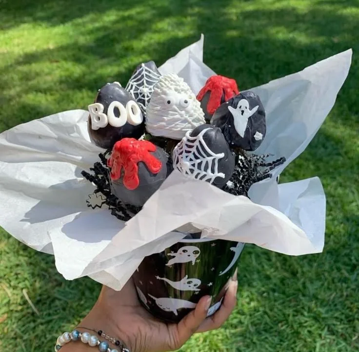 Spooky basket treats and strawberries for Halloween gifts and celebrations