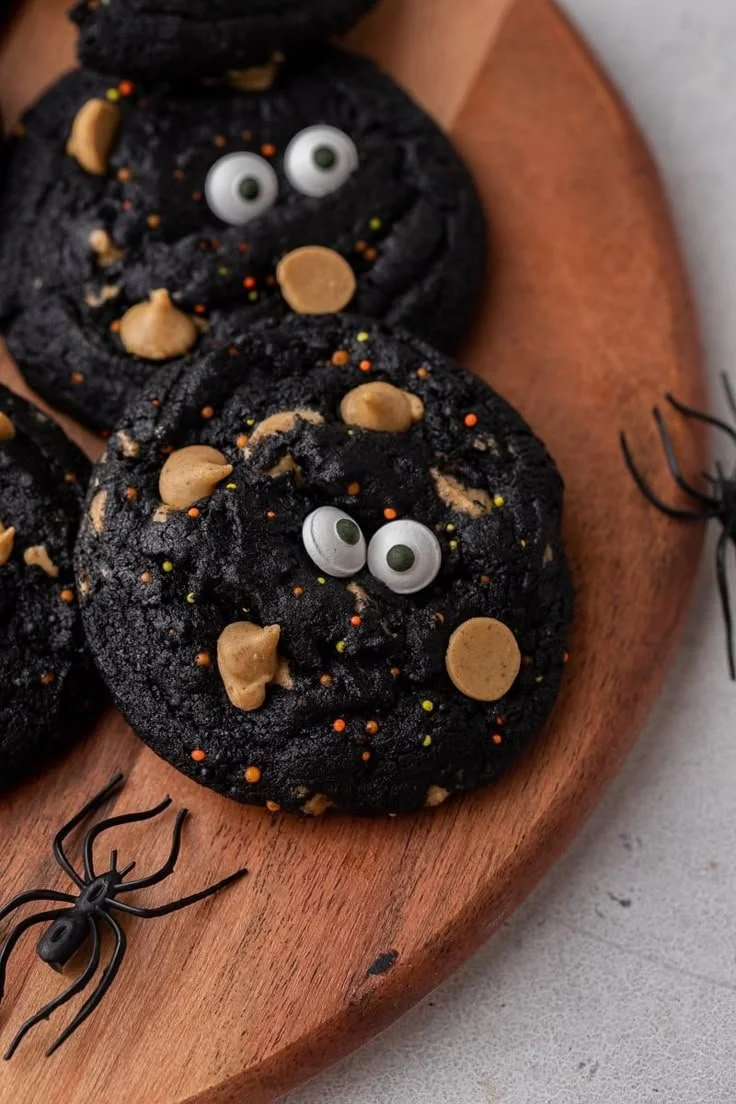 Spooky black Halloween monster cookies decorated for a festive celebration