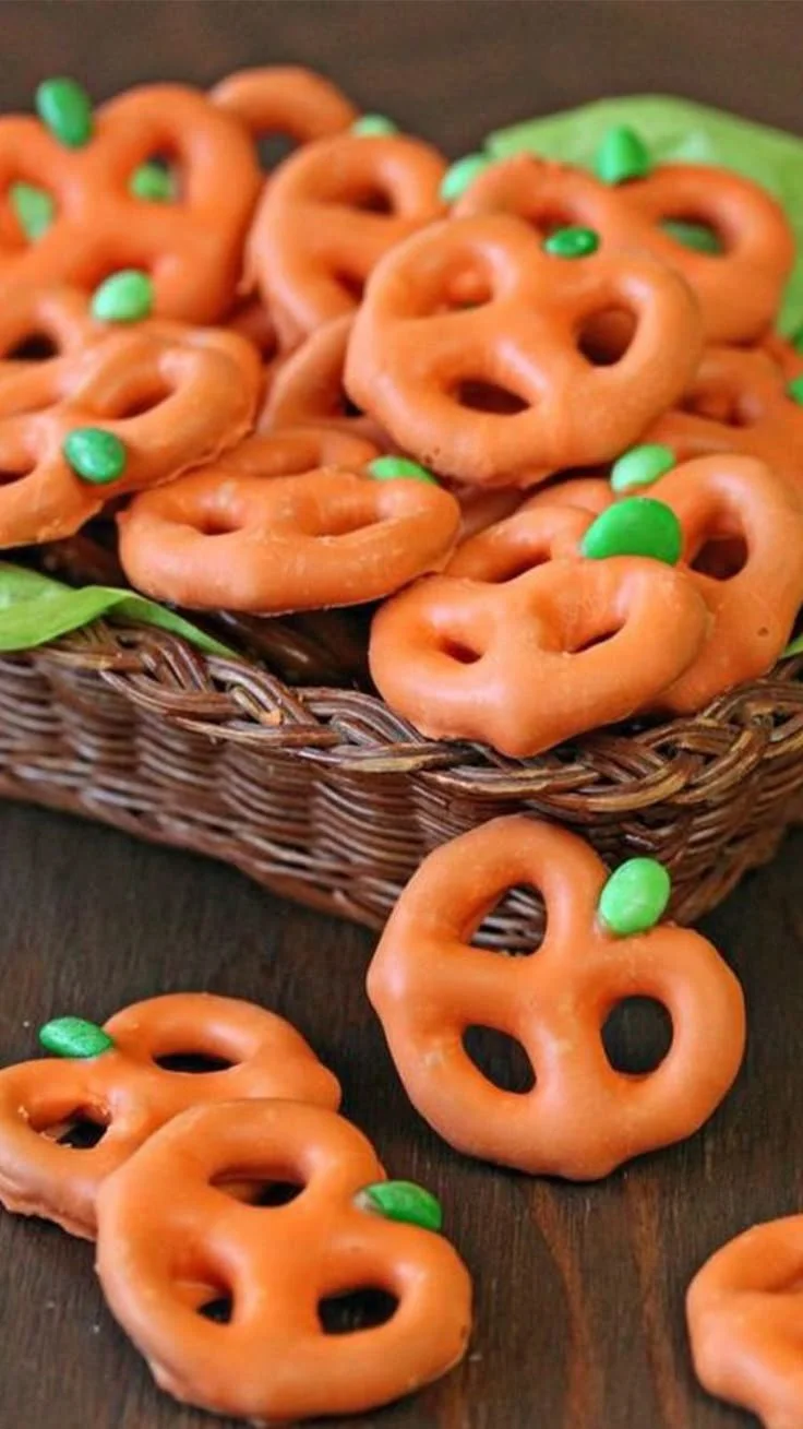 Variety of healthy Halloween snacks on a festive table.