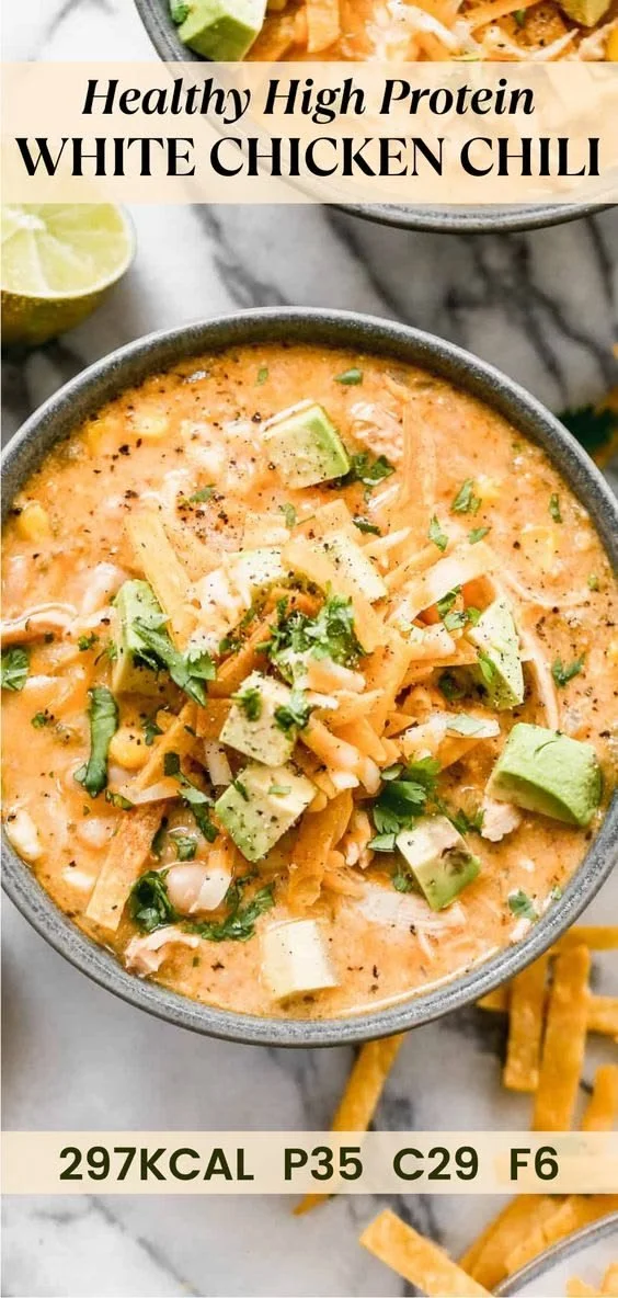 Delicious bowl of White Chicken Chili garnished with cilantro and lime